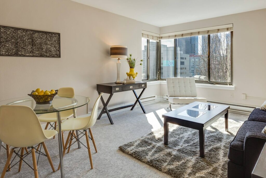 Small Apartment Rug and Tables Space Divided